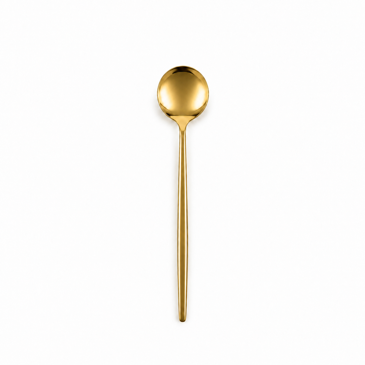Petite cuillère de table dorée à coupe ronde sur fond blanc – location Décolina